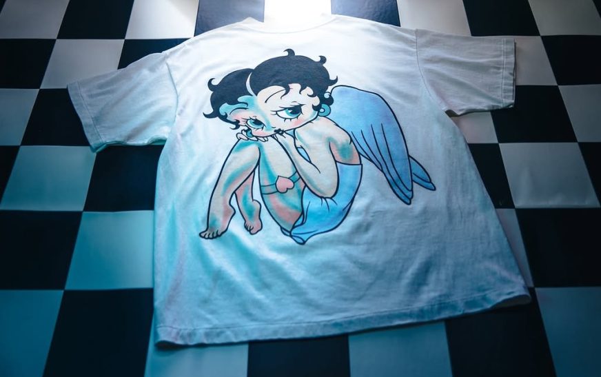 SAINT Mxxxxxx × BETTY BOOP Second Collaboration Drops, Reimagining the Classic Character as Angel and Devil