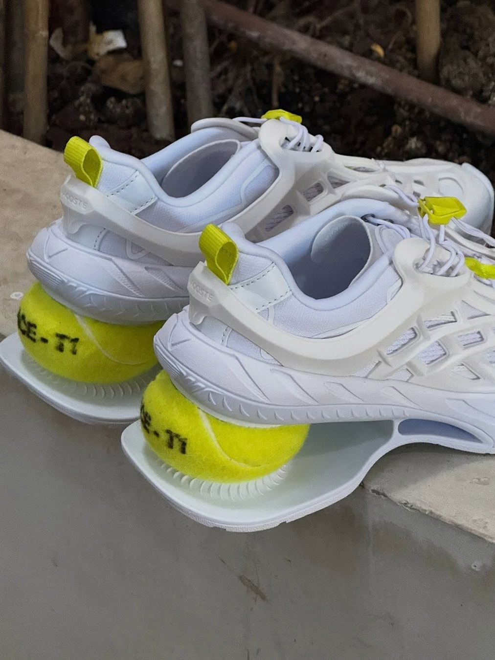 LACOSTE ACE-T Unveiled at Paris Fashion Week, With a Real Tennis Ball Embedded in the Heel